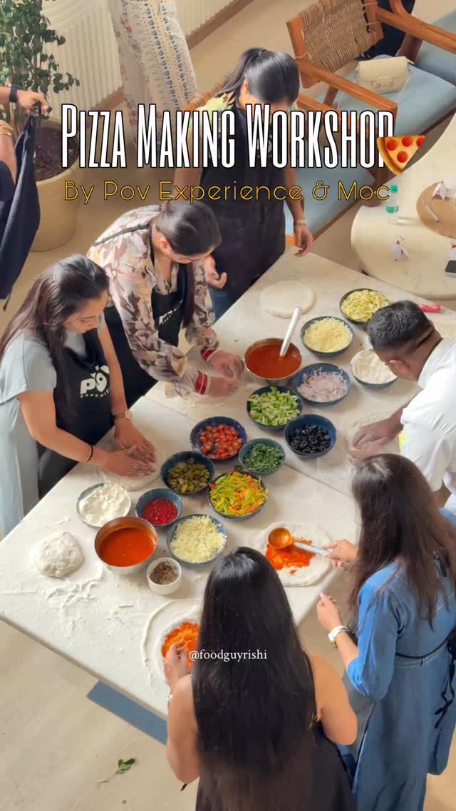 MOC pizza workshop table with fresh ingredients and full plates from Instagram